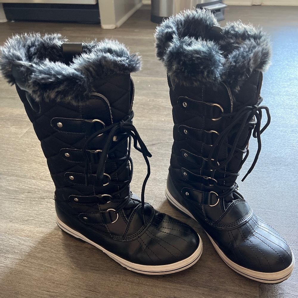 Black and white snow boots